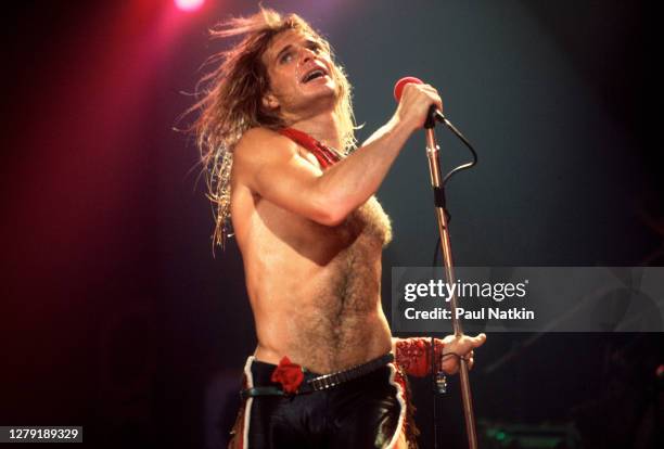 American Rock musician David Lee Roth, of the group Van Halen, performs onstage at the International Amphitheater, Chicago, Illinois, October 11,...