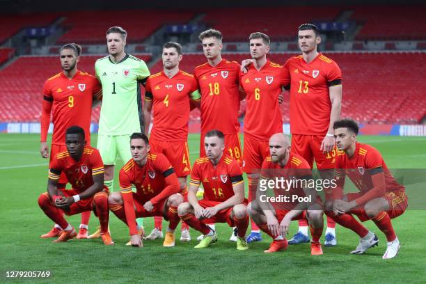 The Wales team poses for a team photo ahead of the international friendly match between England and Wales at Wembley Stadium on October 08, 2020 in...