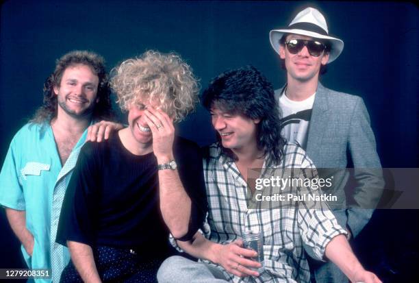 Portrait of Rock musicians Michael Anthony, Sammy Hagar, Eddie Van Halen , and Alex Van Halen, all of the group Van Halen, backstage at the Metro...