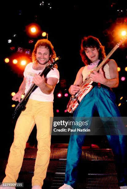 Rock musicians Michael Anthony and Eddie Van Halen , both of the group Van Halen, perform onstage at the Metro Center, Rockford, Illinois, March 16,...