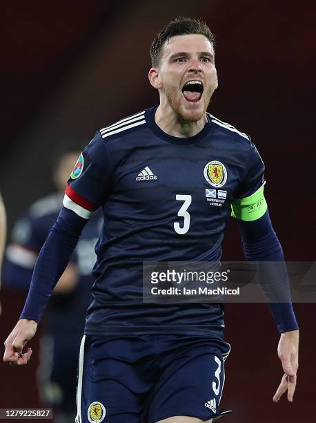 Andy Robertson of Scotland celebrates after his teams victory in the penalty shoot out during the UEFA EURO 2020 Play-Off semi-finals match between...