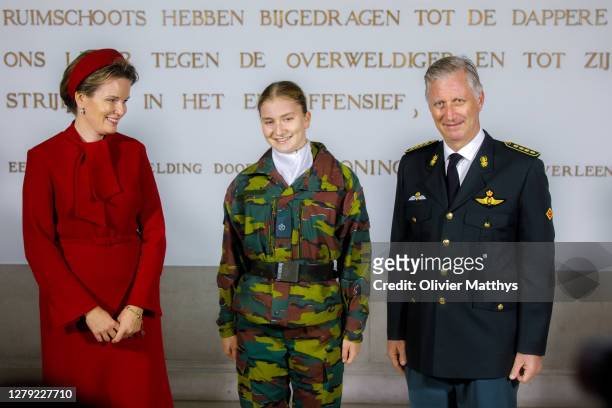 King Philippe of Belgium, Queen Mathilde and Princess Elisabeth pose for an official photograph at the Royal Military School on October 08, 2020 in...