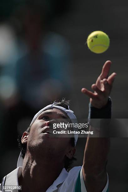Somdev Devvarman of India serves during his first round match against Radek Stepanek of the Czech Republic during day one of the Rakuten Open at...