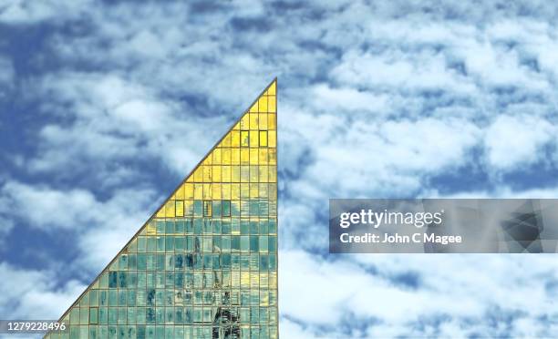 gold modernist triangle - golden clouds stock pictures, royalty-free photos & images