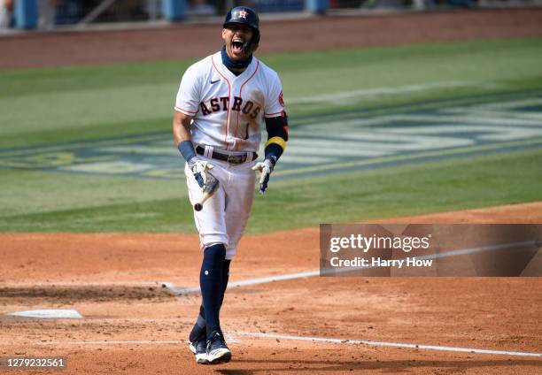 Carlos Correa of the Houston Astros rounds the bases after hitting a three run home run against the Oakland Athletics during the fourth inning in...