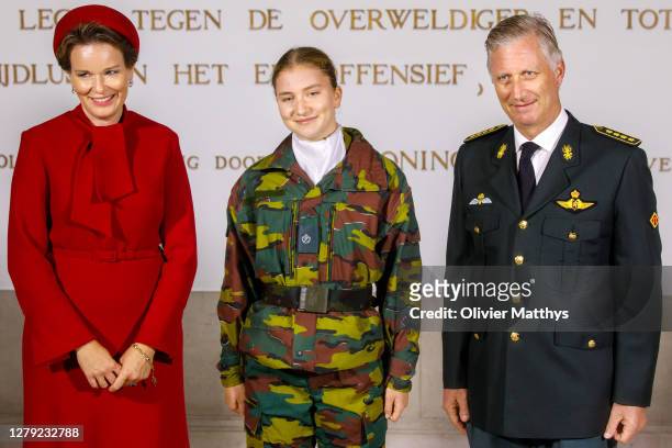 Queen Mathilde, Princess Elisabeth and King Philippe of Belgium pose for their official photograph at the Royal Military School on October 08, 2020...