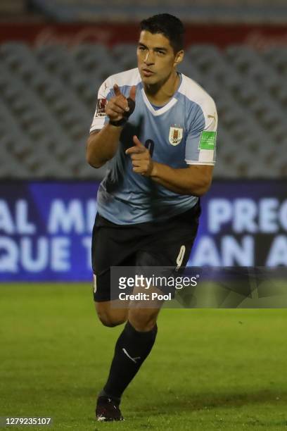 Luis Suarez of Uruguay celebrates after scoring the opening goal of his team during a match between Uruguay and Chile as part of South American...