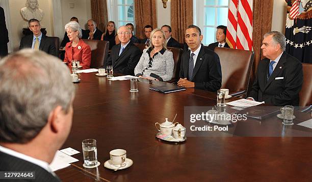 President Barack Obama speaks during a Cabinet Meeting as U.S. Secretary of Education Arne Duncan , U.S. Secretary of Health and Human Services...