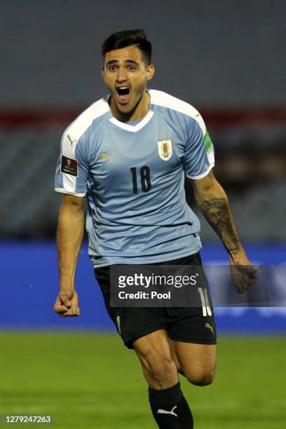 Maximiliano Gomez of Uruguay celebrates after scoring the second goal of his team during a match between Uruguay and Chile as part of South American...