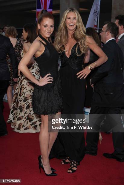 Models Jade Thompson and Elle MacPherson attend the Pride of Britain Awards at the Grosvenor House Hotel on October 3, 2011 in London, England.