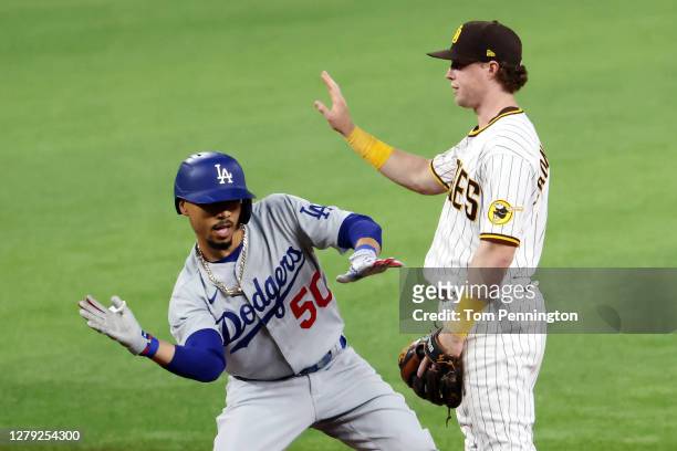 Mookie Betts of the Los Angeles Dodgers reacts at second base after hitting a double during the fourth inning against the San Diego Padres in Game...