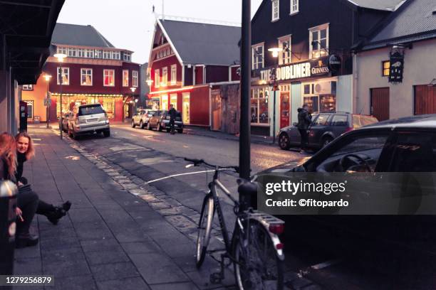after hours in reykjavik downtown some people still in the streets - street party stock pictures, royalty-free photos & images