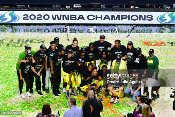 The Seattle Storm pose for a picture after winning the WNBA Championship following Game 3 of the WNBA Finals against the Las Vegas Aces at Feld...