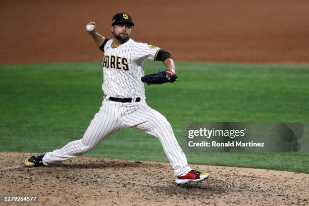 Trevor Rosenthal of the San Diego Padres pitches during the ninth inning against the Los Angeles Dodgers in Game Three of the National League...