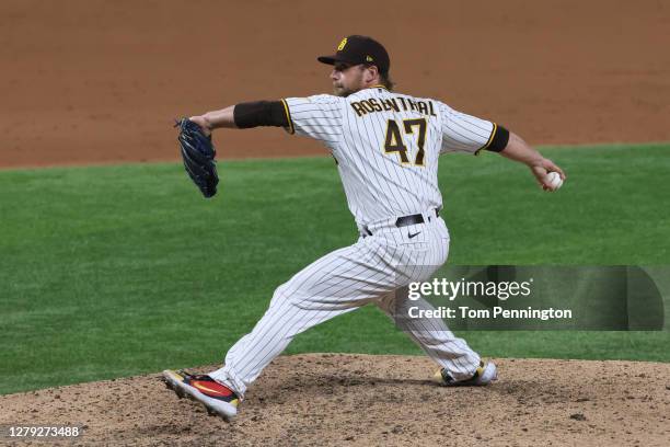 Trevor Rosenthal of the San Diego Padres pitches during the ninth inning against the Los Angeles Dodgers in Game Three of the National League...