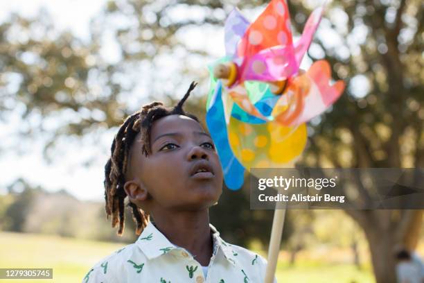 Windmill Boy Boy Paper Windmill Photos and Premium High Res Pictures - Getty Images