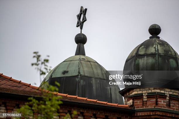 Synagogue stands on the first anniversary of the attack that left two people dead on October 09, 2020 in Halle, Germany. One year ago Stephan...