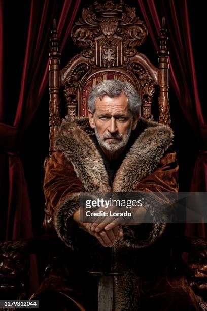 historical king on the throne in studio shoot - throne stock pictures, royalty-free photos & images