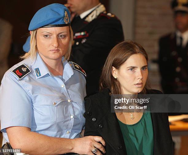 Amanda Knox enters Perugia's Court of Appeal to learn that she won her appeal against her murder conviction on October 3, 2011 in Perugia, Italy....