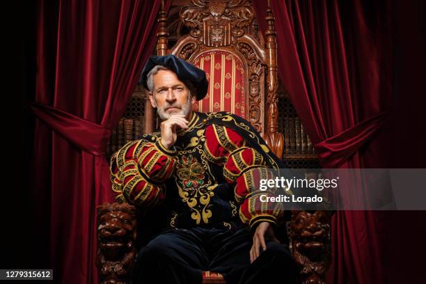 historical king on the throne in studio shoot - king stock pictures, royalty-free photos & images