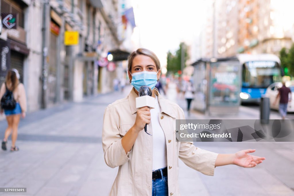 Mask Reporters Female Reporter Wearing Mask Talking Over Microphone On Street In City ...