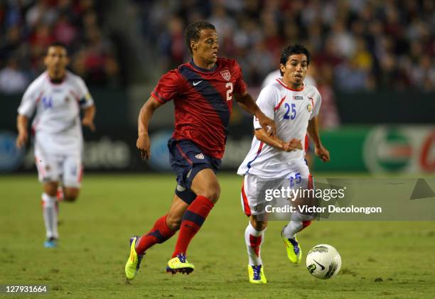 Timmy Chandler of the USA paces the ball on the attack against Alvaro Sanchez of Costa Rica during the International Friendly match at The Home Depot...