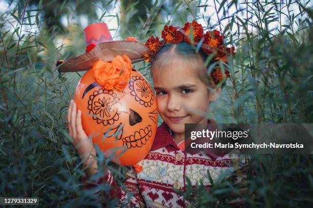Day of the Dead and Halloween. Cute kids wearing in themed costumes for fun party