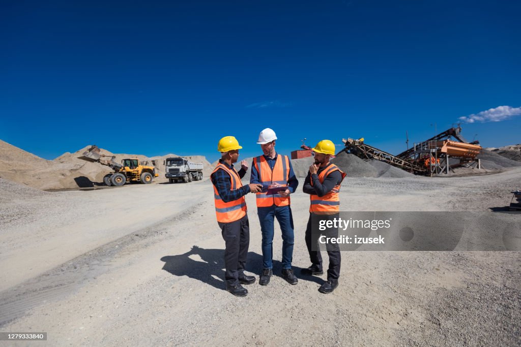 Open-pit mine team discussing plans