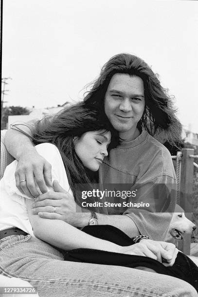 View of married couple, American actress Valerie Bertinelli and Dutch-born American Rock musician Eddie Van Halen as they sit outdoors together, Los...