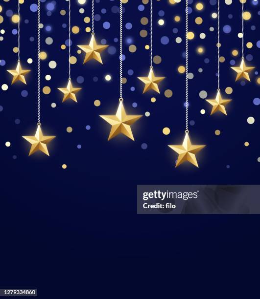 gold star holiday glow sparkle confetti background - hanging mobile stock illustrations