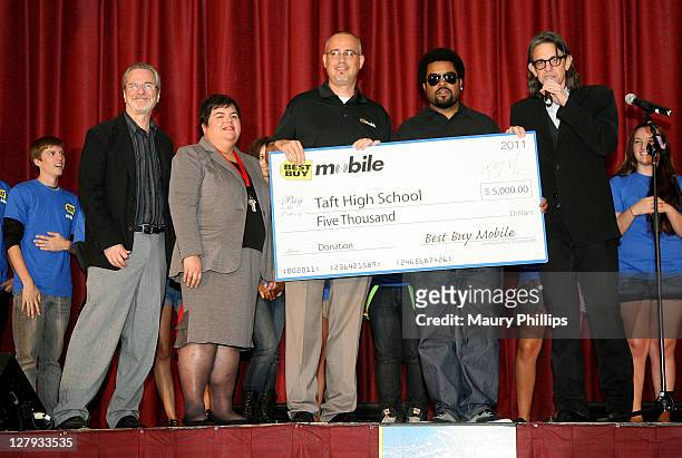 Tom Tease, taft high school principal Delia Estrada, Jason Fike sales manager for Best Buy mobile stand a lone stores, Ice Cube and vice president of...