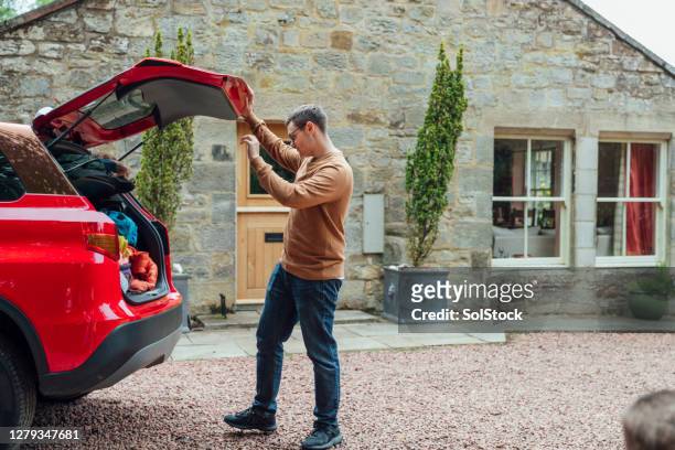 ready to unpack - red car stock pictures, royalty-free photos & images