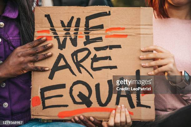 group of women demostrating fos social equity - black lives matter stock pictures, royalty-free photos & images