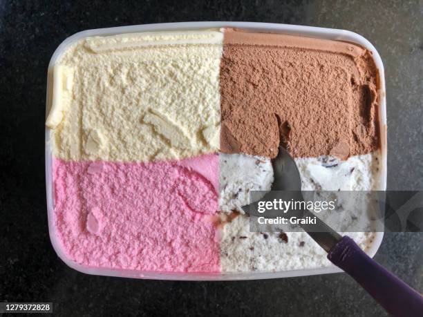 ice cream jar with 4 flavors. strawberry, vanilla, chocolate and flakes. - sorbet isolated stock pictures, royalty-free photos & images