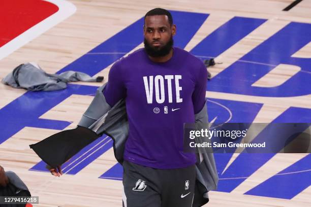 LeBron James of the Los Angeles Lakers wears a VOTE shirt during warm-up prior to the start of the game against the Miami Heat in Game Five of the...