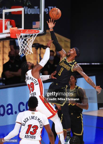 Kentavious Caldwell-Pope of the Los Angeles Lakers fights for a rebound against Jae Crowder of the Miami Heat during the first quarter in Game Five...