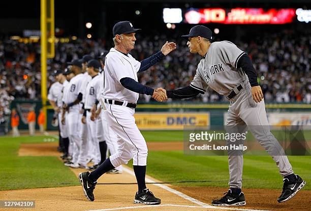 Detroit Tigers manager Jim Leyland and New York Yankees manager Joe Girardi shake hands prior to the start of the game at Comerica Park on October 3,...
