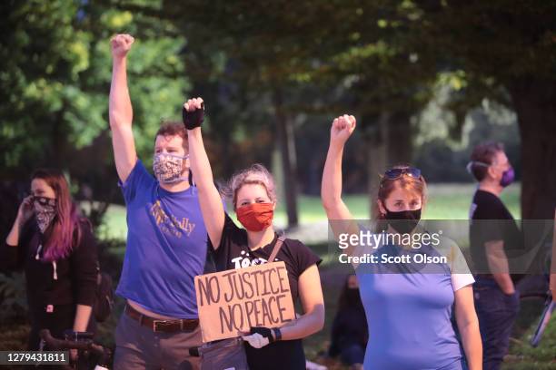 Protestors demonstrate near the Wauwatosa City Hal on October 09, 2020 in Wauwatosa, Wisconsin. The city has faced three days of demonstrations,...