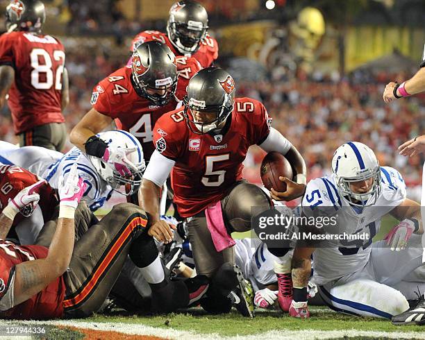 Quarterback Josh Freeman of the Tampa Bay Buccaneers runs for a touchdown against the Indianapolis Colts October 3, 2011 at Raymond James Stadium in...