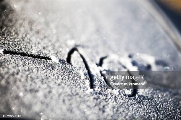 close-up of frost pattern on car - subtraction stock pictures, royalty-free photos & images