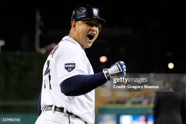 Miguel Cabrera of the Detroit Tigers reacts to a home run by Delmon Young in the seventh inning of Game Three of the American League Division Series...