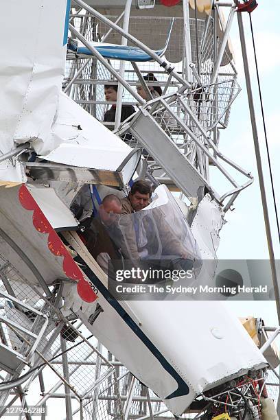 Light plane crashed into the Ferris wheel at Old Bar, near Taree on the NSW North Coast. Rescue workers were able to free the passenger and pilot as...