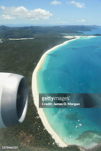 Qantas flight number QF787, a Boeing 787 Dreamliner aircraft flies close to Whitehaven Beach, Whitsunday Islands, Queensland on October 10, 2020 in...