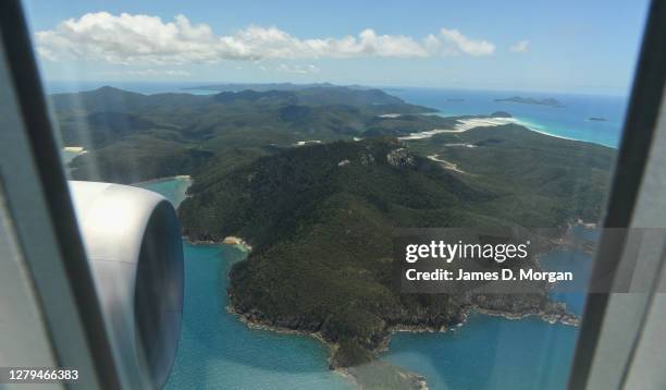 Qantas flight number QF787, a Boeing 787 Dreamliner aircraft flies close to Whitehaven Beach, Whitsunday Islands, Queensland on October 10, 2020 in...