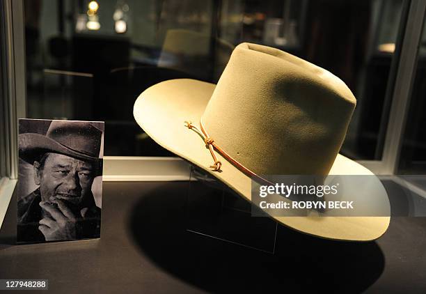 Stetson cowboy hat worn by actor John Wayne in "The Man Who Shot Liberty Valance" is on display at an auction preview of items owned by the iconic...
