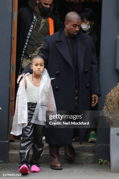 Kanye West seen leaving Michiko Sushino restaurant with his daughter North West in Queen's Park on October 10, 2020 in London, England.