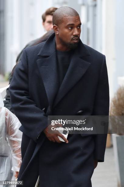 Kanye West seen leaving Michiko Sushino restaurant with his daughter North West in Queen's Park on October 10, 2020 in London, England.