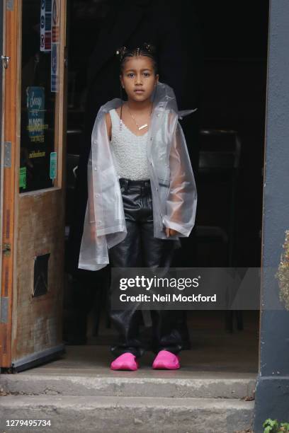 Kanye West seen leaving Michiko Sushino restaurant with his daughter North West in Queen's Park on October 10, 2020 in London, England.