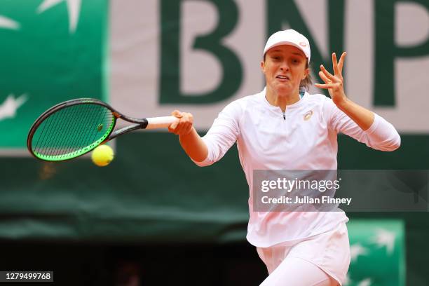 Iga Swiatek of Poland plays a forehand during her Women's Singles Final against Sofia Kenin of The United States of America on day fourteen of the...