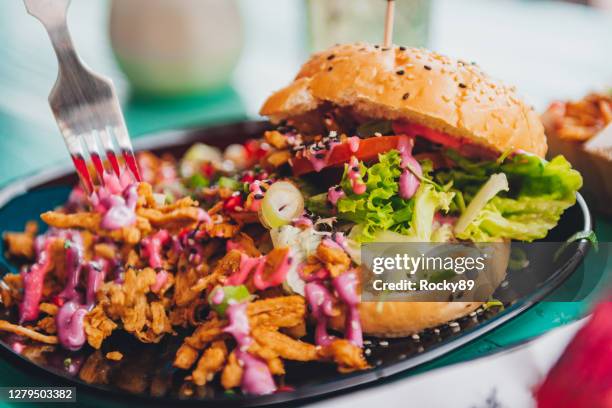 vegan burger feast with pulled jackfruit and jalapeños - diner plates stock pictures, royalty-free photos & images